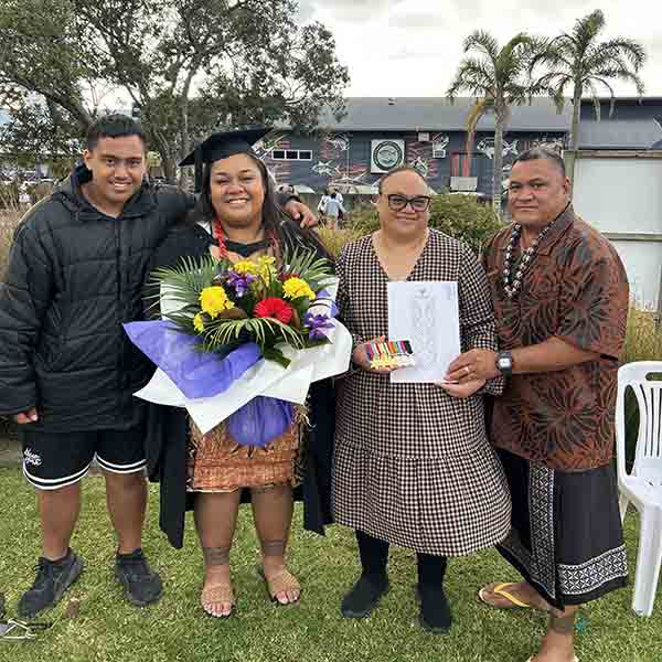 Genesis Kiliata pictured with her whānau at her graduation