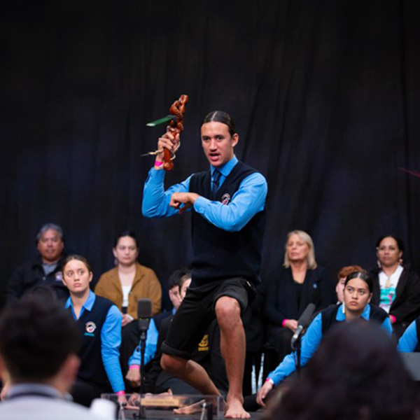 Speaking contestant at ngā manu kōrero